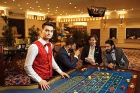 Live Bandar Ceme table on rekapan hk showing dealer, player seats, and card display